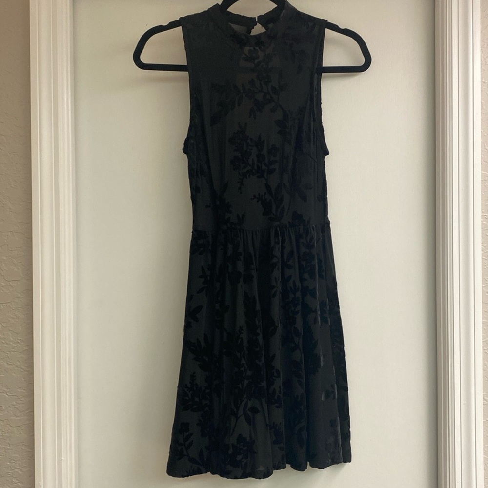 Women’s Forever 21 black dress with velvet flowers. Open back. Size small.